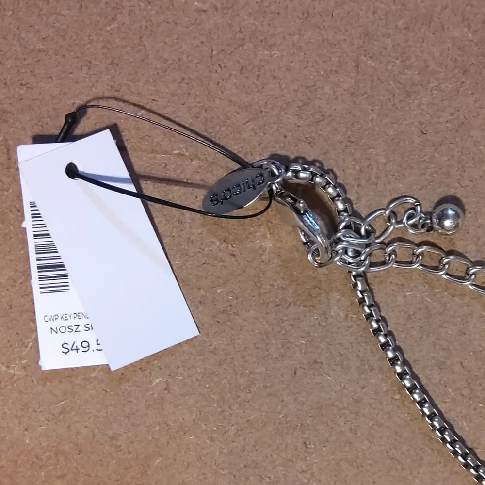 Chico's Silvertone Key Necklace with styles. - Picture 4 of 5